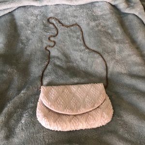 Small white beaded clutch